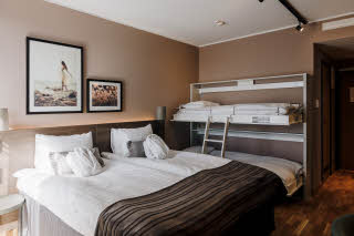 Foto: David Thunander Beds in Superior Family Room
